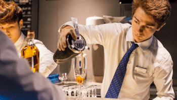 bartender-guy-pouring-cocktail